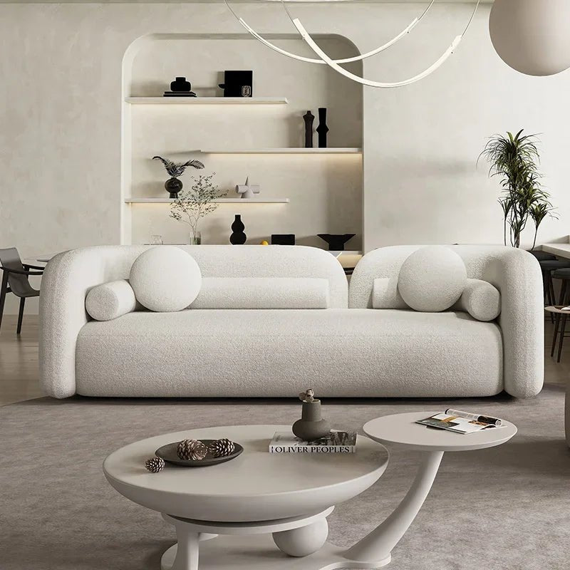 bacio-boucle-sofa-981177 كنب مودرن فاخر من قماش البوكليه – تصميم انسيابي مريح - الصورة 1